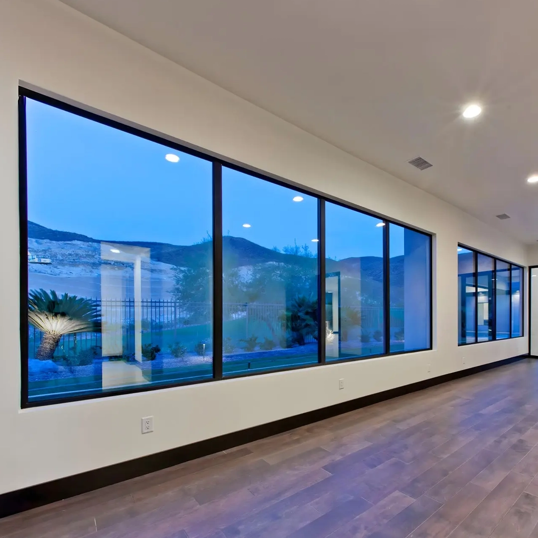 Large fixed architectural impact windows on a modern property
